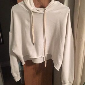 A eggshell white cropped hoodie